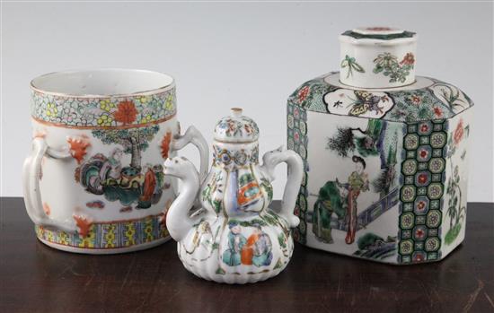 A Chinese enamelled porcelain tea caddy and cover, a wine pot and cover and a three handled tyg, 19th century, 11cm - 15cm
